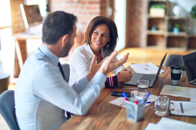 A smiling business woman is developing her business